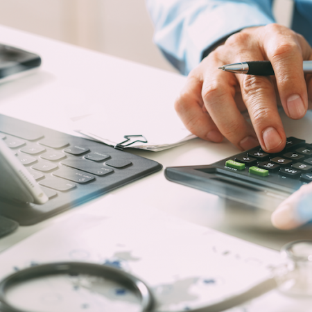 man using calculator